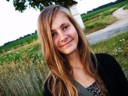 smiling young girl outside