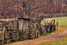 wood fence and barn in the countryside