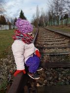 Landscape wih the child on the rail track