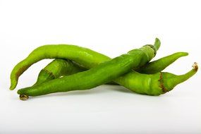 Three green chili peppers