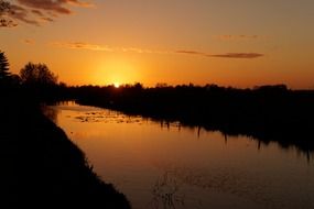 peaceful romantic sunset on a river