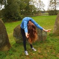 girl tilts her body forward