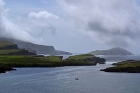 small islands near scenic rocky coastline