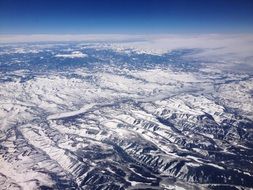 snowy mountain ridge with a bird's-eye view