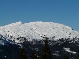 high alpine hill under the blue sky