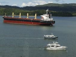landscape of Boats near the tanker on the water