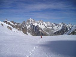 remote view of a climber in the mont blanc mountains