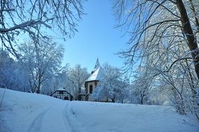 church in snow forest