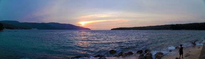 sunset over mountain sea panorama