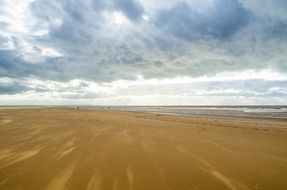 yellow sand on the beach by the sea