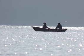 fishing boat on lake sunny scene