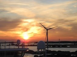 windmill and colorful sunset