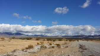 desert area with mountains in the background