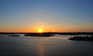 panorama of small islands in the sea at sunset