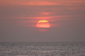 pink sun in the evening at dusk
