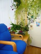 Waiting area with a blue chair