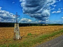 road cross with cloudy sky in france