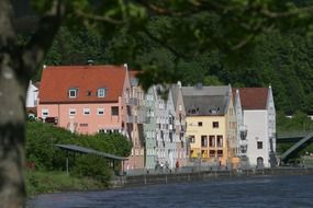 colorful houses at river, germany, riedenburg, altmÃ¼hltal nature park