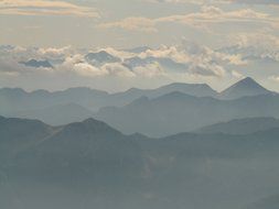 magnificent mountain peaks in the fog