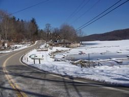 snow on the edges of the highway in new york