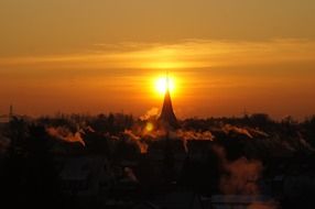 sunrise above the trees