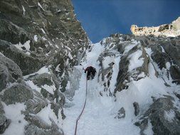 ice channel for ice climbing on the mountains