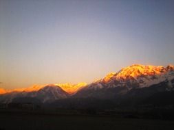 yellow sunlight on the mountain tops