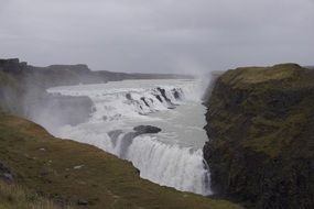 Waterfall on a rock in Iceland