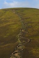 path on a green hill