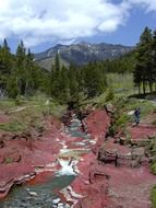 red cliffs in waterton provincial park landscape
