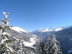 Panorama of the mountains with the snow on a sunny day