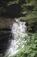 waterfall like a cascade stream among nature