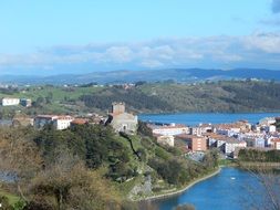 panoramic photo of the castle on the hill on the island