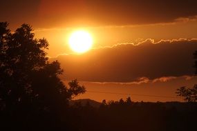 sunset on the cloudy sky