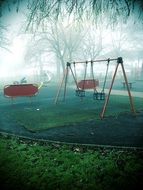 playground in a foggy park