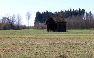 barn in the middle of the field