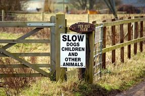 sign on a wooden fence