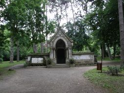 stone vault in the park with the trees