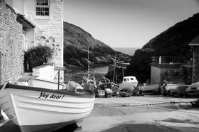 village on the coast in black and white image