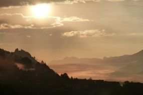 mountains in the haze at sunrise in the fall