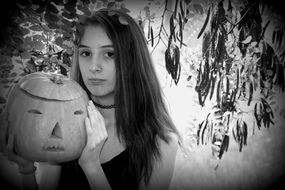 halloween pumpkin and girl black and white photo