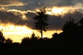 sunrise behind the clouds