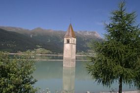 spire of sunken church in South Tyrol