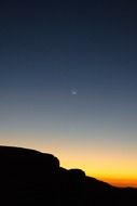 Crescent moon on a night sky