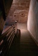 wooden staircase in light and shadow