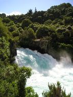 panoramic view of strong waterfall in new zealand