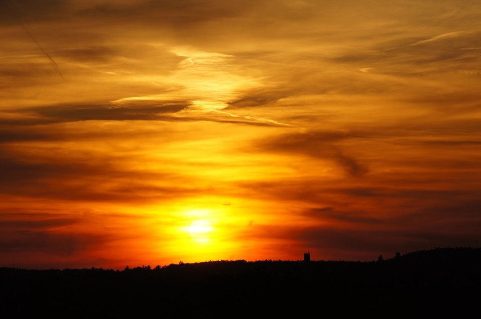 flame-colored sky at sunset
