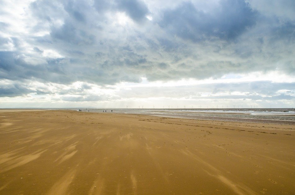 yellow sand on the beach by the sea