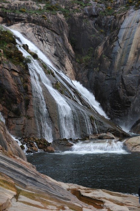 Waterfall on the rocks in galicia