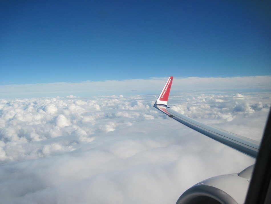 view from the planes to the lush white clouds